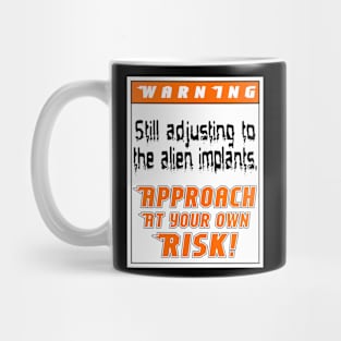 Warning: Still adjusting to the alien implants Mug